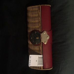 Michael Kors clutch metal hardware
